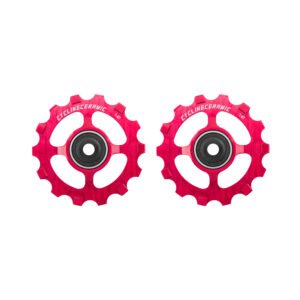 SRAM XPLR 12-speed derailleur pulleys in striking red. Designed for gravel and adventure riding, these pulleys ensure precise shifting and enhanced performance on varied terrains.