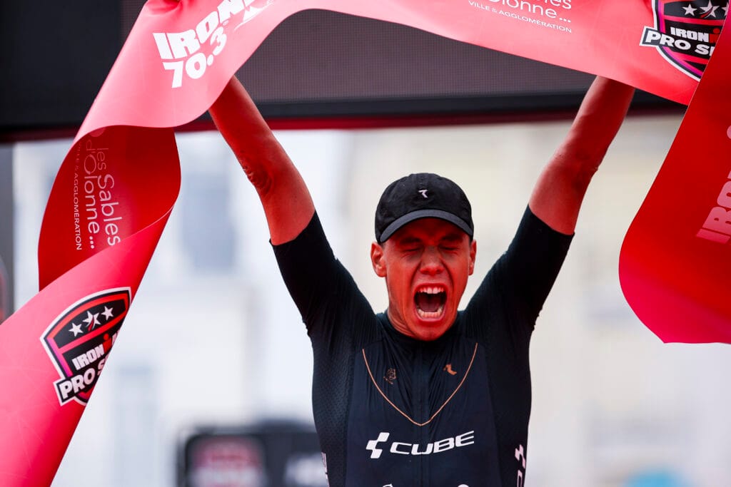 LES SABLES-D'OLONNE, FRANCE - JUNE 29: Nicolas Mann of Germany celebrates winning the Men's race of the IRONMAN 70.3 Les Sables d'Olonne on June 29, 2024 in Les Sables-d'Olonne, France. (Photo by Eric Alonso/Getty Images for IRONMAN)